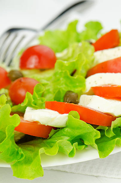 Salad with tomatoes and mozzarella stock photo