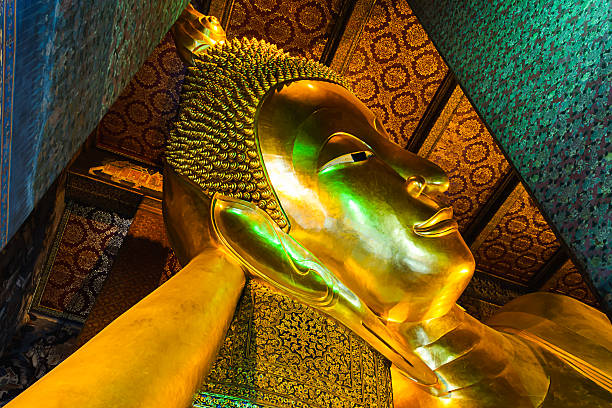 Golden buddha statue in Wat Po, Thailand Golden buddha statue in Wat Po, Thailand golden tample stock pictures, royalty-free photos & images