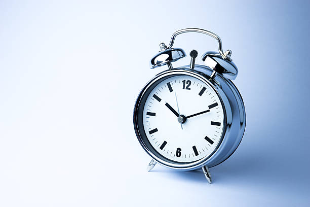 istock Metal Alarm clock, wake up time, on white background 498956417