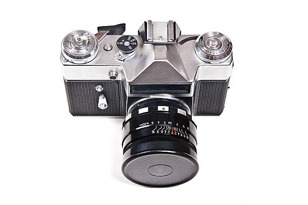 istock Old range finder vintage photo camera on white background. 498972170