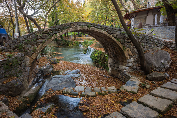 istock Autumn landscape with a river and small house 498972782