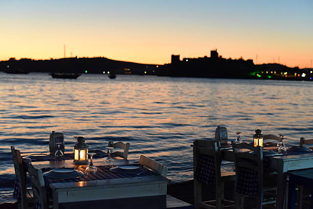istock Romantic dinner near sea at sunset time 498972962