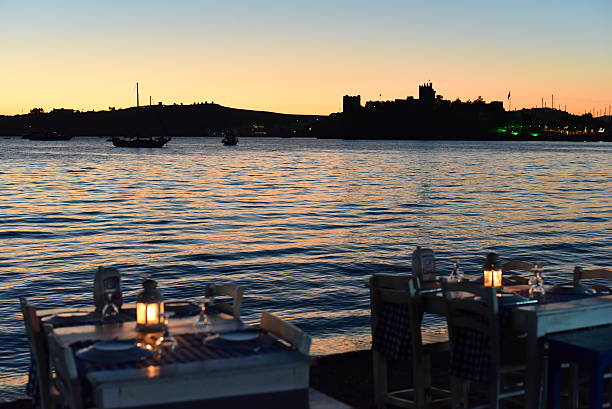 istock Romantic dinner near sea at sunset time 498973892