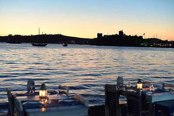istock Romantic dinner near sea at sunset time 498974294