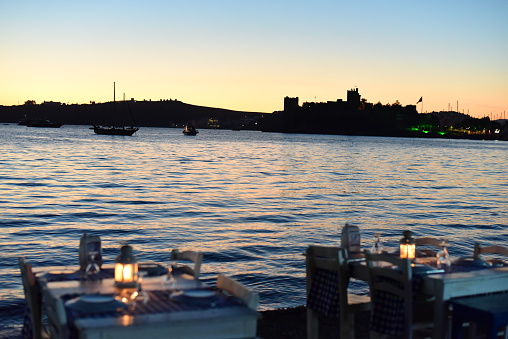 Romantic dinner near sea at sunset time. Photo is taken in Bodrum, Turkey.