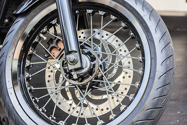 istock Motorcycle wheel in black and white with ABS brakes. 498975386