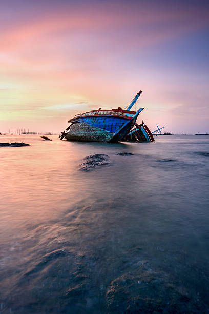 istock Thai Fisherman boat 498975977