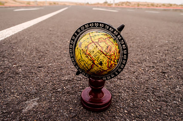 istock Globe Earth on an Asphalt Street 498976190