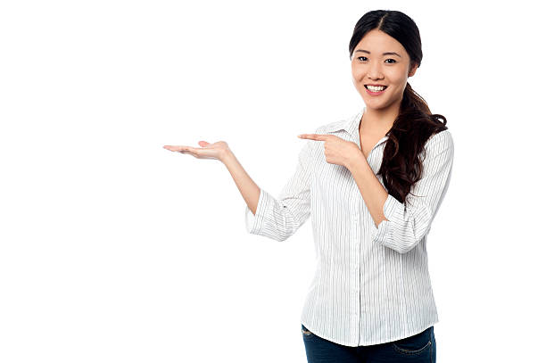 istock Young girl promoting a product 498976265