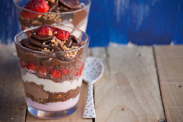 istock Chocolate cake dessert, yogurt and strawberries 498977595