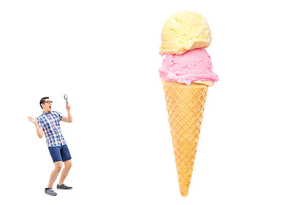 istock Man looking at an ice cream through a magnifier 498977613