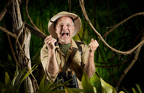 istock Explorer lost at night in the forest 498978365