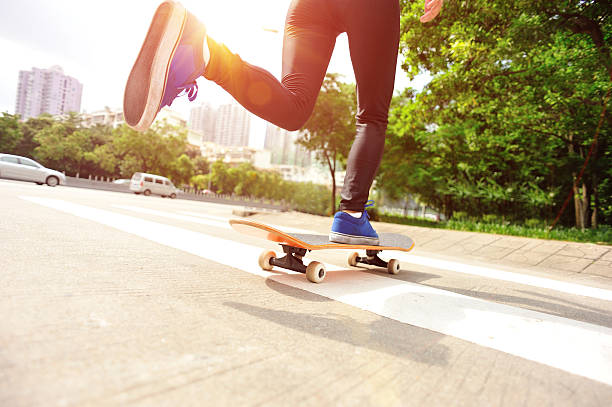 istock speeding skateboarding woman 498980289