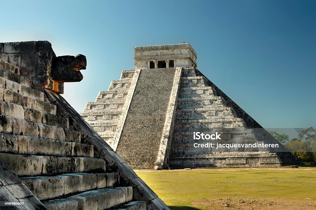 The Mayan temple complex of Chichen Itza, Yucatan, Mexico The Mayan temple complex of Chichen Itza, Yucatan, Mexico. In front of the picture another religious building with a sculpture. Chichen Itza Stock Photo