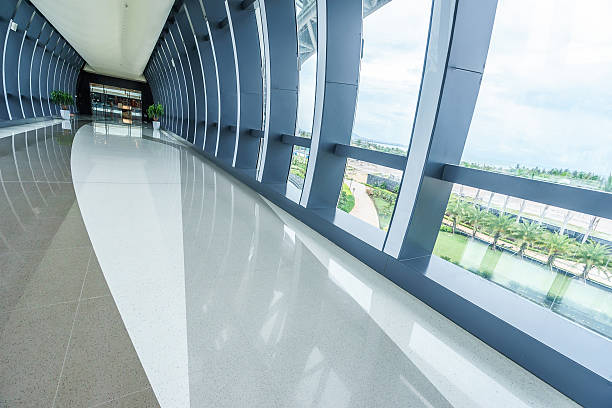 istock corridor with many glass windows in modern shopping mall 498980618