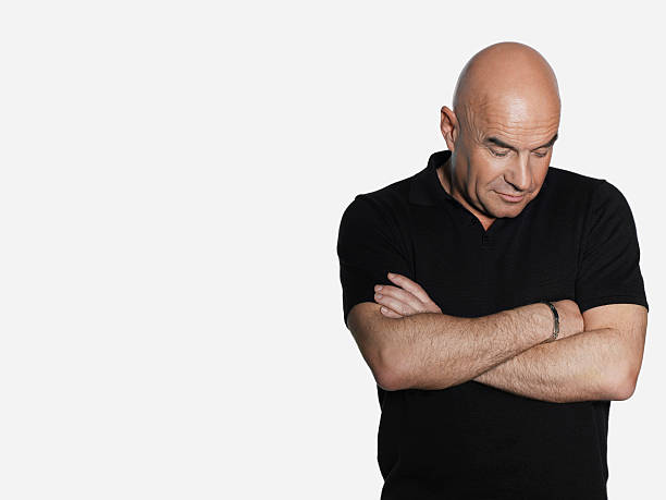 istock Upset Middle Aged Man With Arms Crossed 498982519