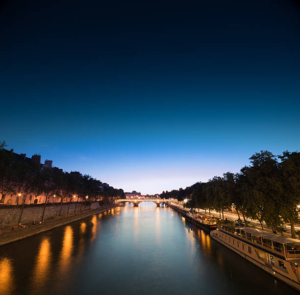 istock Seine river at night time, a view from a bridge 498992162