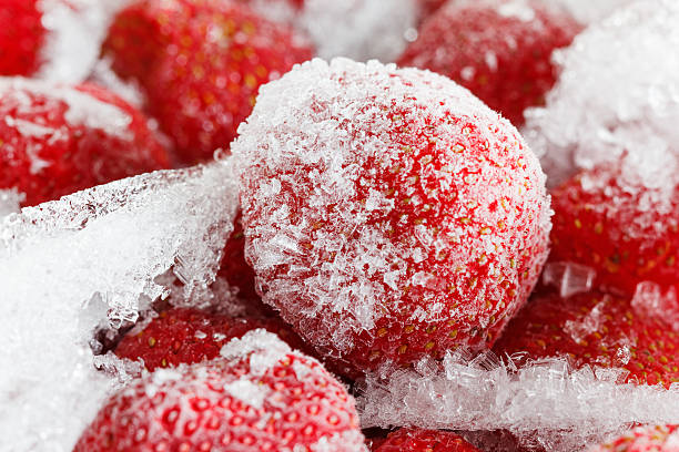 istock Strawberries, frozen for long term fruits storage. 498994148