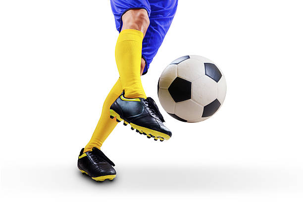 istock Football player kicking the ball 498994841