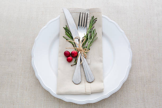 istock Christmas and New year table place setting with decorations. 498995426