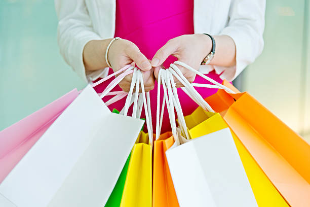 istock Woman holding shopping bags 498996722