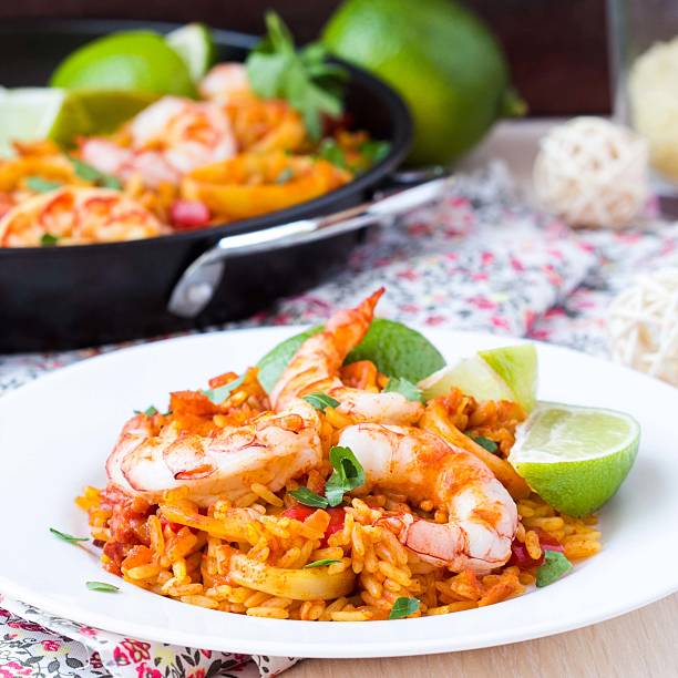 istock Spanish dish paella with seafood, shrimps, squid, rice, saffron 498996743