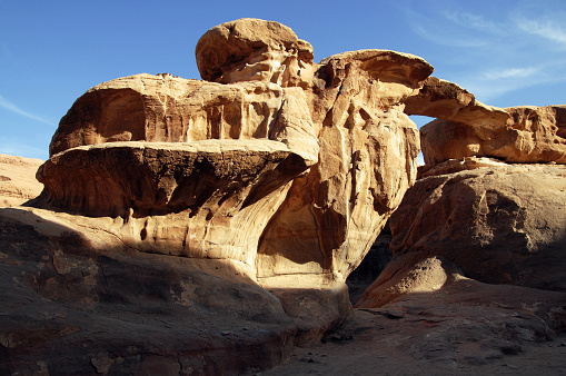 Natural Rock Arch in Wadi Rum .