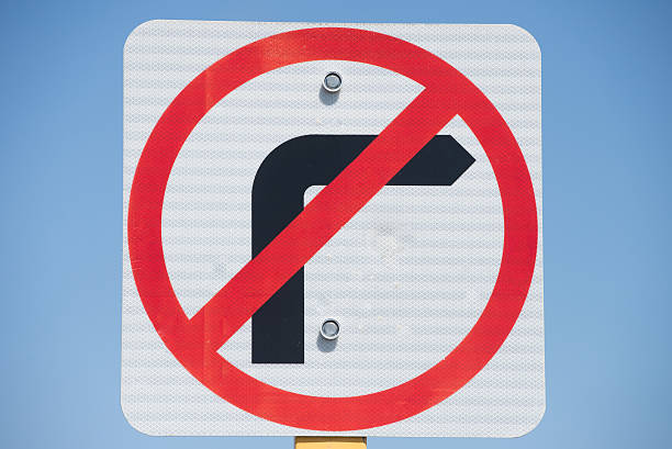 istock Street sign no turning right symbol 498998666