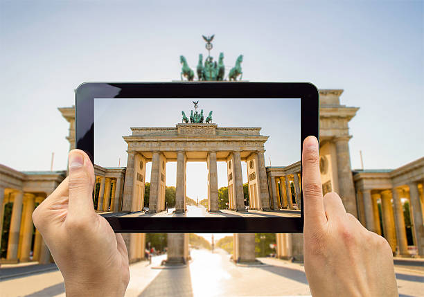 istock photographing with my tablet the Brandenburg Gate 498999677