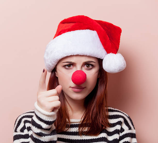 istock woman with red clown nose 499000108