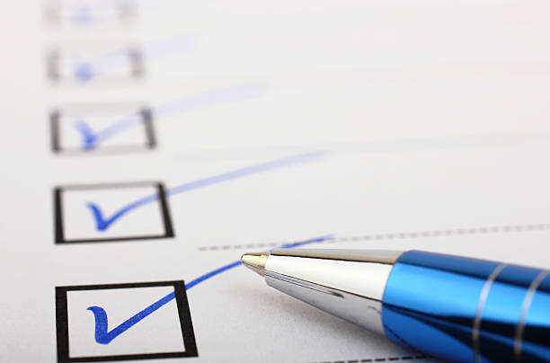 Checklist and pen Checklist and pen ballpoint pen photos stock pictures, royalty-free photos & images