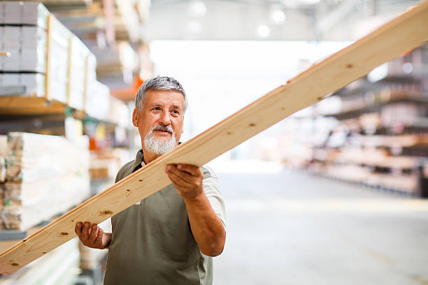 istock Senior man buying construction wood in a  DIY store 499001163