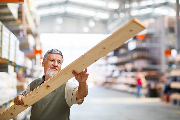 istock Senior man buying construction wood in a  DIY store 499001167
