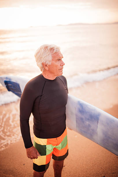 istock Portrait of a senior surfer 499001182
