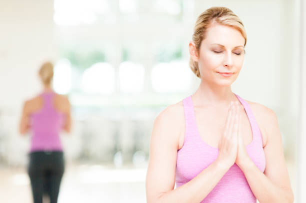 istock Blonde Woman Practicing Yoga 499003362