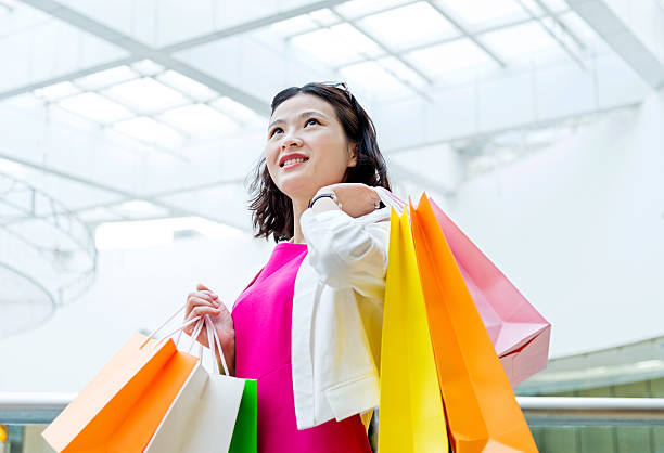 istock Attractive asian woman shopping 499005204