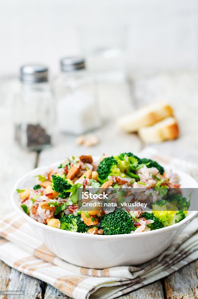 broccoli chickpea cilantro almond white and red rice broccoli chickpea cilantro almond white and red rice. toning. selective Focus Salad Stock Photo