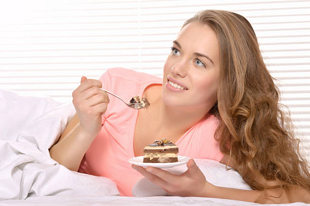 istock Beautiful young woman waking up 499006404