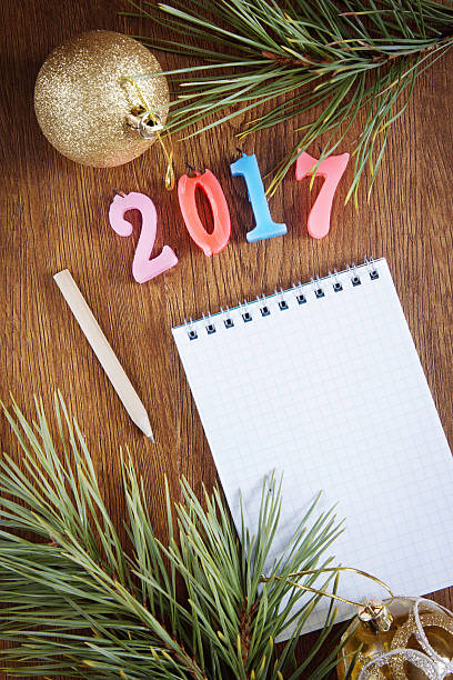 istock Bright background with blank notepad about Happy New Year holiday 499007540