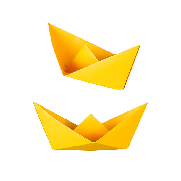 istock origami boat or paper boat on white background 499017090