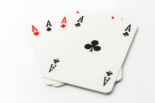 istock Four aces poker cards isolated on white background 499017120