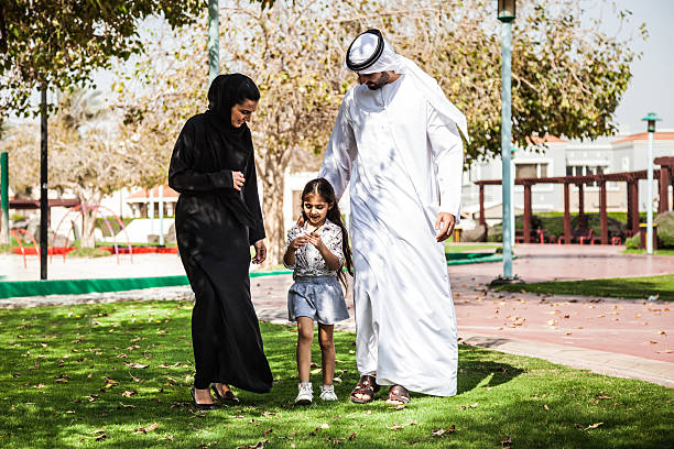 istock Traditional Emirati young family enjoying weekend 499018186
