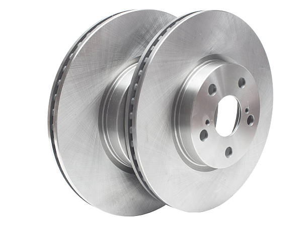 istock two brake discs and brake pads on a white background 499018400