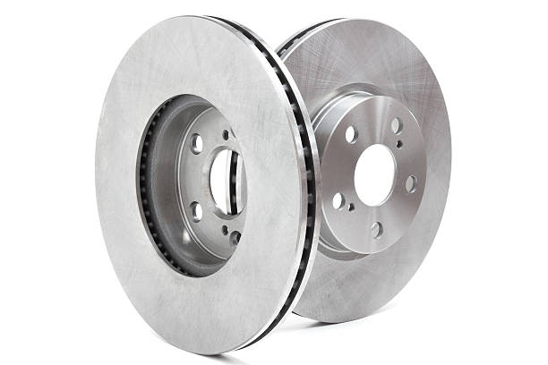 istock two brake discs and brake pads on a white background 499018676