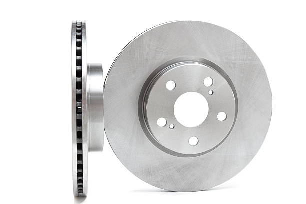 istock two brake discs and brake pads on a white background 499018692