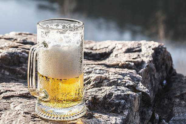 istock Mug of excellent beer sparkles on a rock 499020328