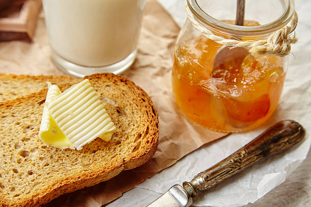 istock Closeup breakfast with toast, roasted pan with butter and aprico 499021952