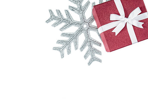 istock red color gift box for holiday event silk wrap snowflake 499023472