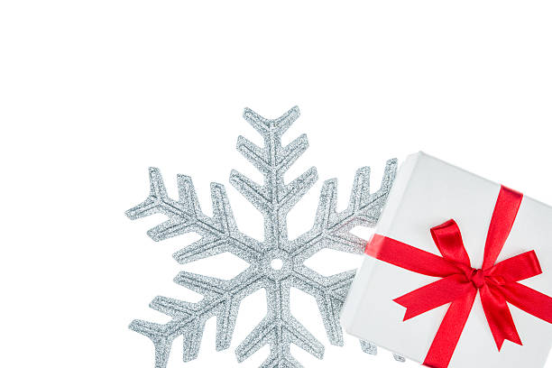istock white color gift box for holiday event silk wrap snowflake 499023972