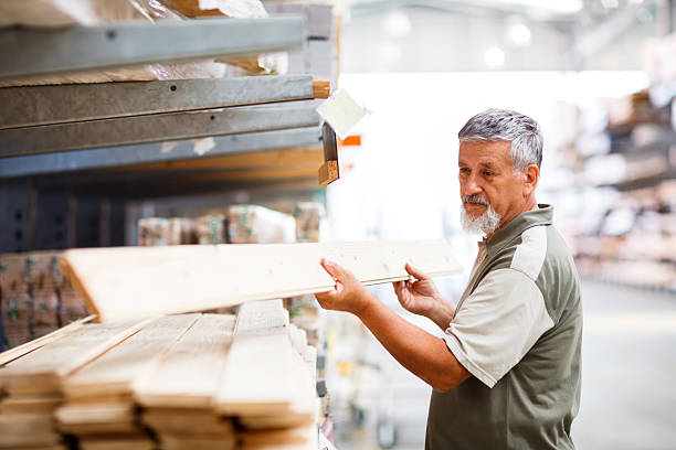 istock Senior man buying construction wood in a  DIY store 499027543
